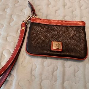 Dooney and Bourke medium wristlet in rich pebble grain leather